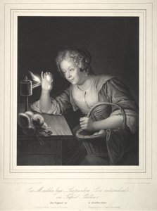 Mädchen beim Durchleuchten von Eiern
