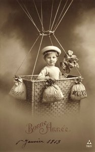 Neujahrskarte 1913, mit einem Jungen, der einen Ballon besteigt, mit viel Geld als Ballast von French Photographer