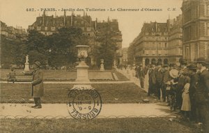 Vogelbändiger im Jardin des Tuileries, Paris. Postkarte von 1913.