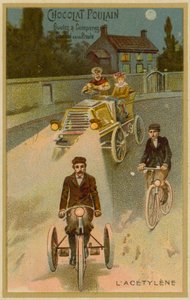 Acetylen-Scheinwerfer an einem Auto und einem Motorrad von French School