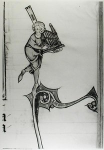 Musiker spielt eine tragbare Orgel, aus der Geschichte von Merlin