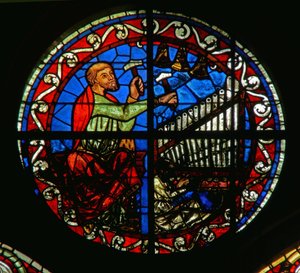 Rosettenfenster mit einer Orgel und Glocken von French School