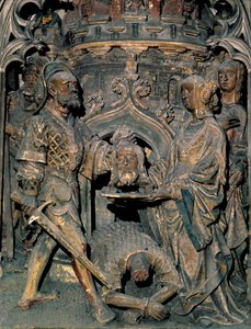 Der Tod von Johannes dem Täufer. Der Kopf von Johannes dem Täufer wird auf einem Tablett präsentiert, das Salome ihrer Mutter überreicht. Relief der Kathedrale Notre-Dame d