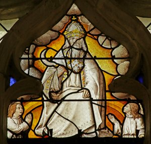 Fenster, das eine Szene aus dem Buch der Offenbarung darstellt: Gott mit Sichel