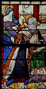 Fenster w13 zeigt Anne de Montmorency mit St. Anna, die der Jungfrau das Lesen beibringt
