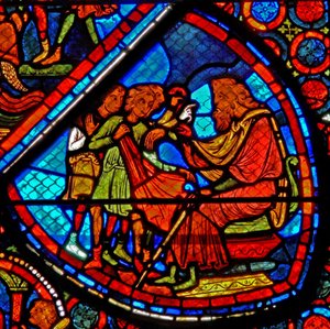 Fenster w24 zeigt eine Szene aus der Geschichte von Joseph: seine Brüder mit ihrem Vater Jakob