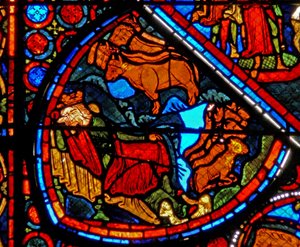 Fenster w24 zeigt eine Szene aus der Geschichte von Joseph: der Pharao träumt von den fetten und mageren Jahren
