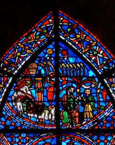 Fenster w9 mit Darstellung von Josephs Traum; die Sonne, der Mond, die Sterne und die Garben seiner Brüder verneigen sich vor ihm. Sein Vater tadelt ihn. von French School
