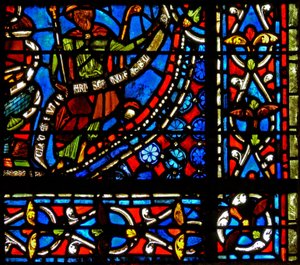 Fenster w9 mit Darstellung des Pharaos, der eine Banderole mit den Worten 