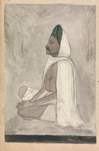 Mann mit grünem Turban, im Schneidersitz