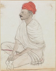 Mann mit rotem Turban, im Schneidersitz