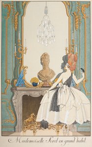 Mademoiselle Sorel in großem Habit. Eine Frau steht vor einem Kamin. von Georges Barbier
