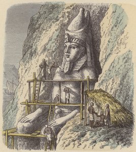 Schnitzen einer Statue eines altägyptischen Pharaos aus einem Felsen von German School