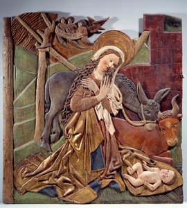 Geburt Christi (Relief auf der Innenseite des Altars in polychromem Holz der deutschen Schule, 1510)