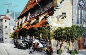 Postkarte, die das Restaurant Bratwurstglöcklein in Nürnberg zeigt, vor 1914 von German School