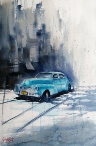 Türkises klassisches Auto auf der Straße
