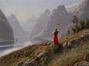 Mädchen mit Rechen in Fjordlandschaft