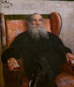Leo Tolstoi in einem rosa Sessel