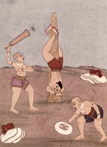 Akrobaten führen körperliche Kunststücke vor