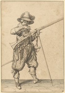 Ein Soldat auf Wache, der das Streichholz bläst