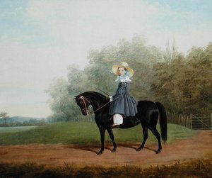 Porträt eines Mädchens auf einem Pferd