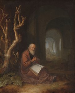 Ein Einsiedler betet in einer Ruine