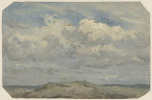 Dünenkuppe mit Meer im Hintergrund