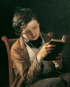 Lesender Knabe