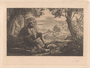 Sitzender Mann in Hügellandschaft