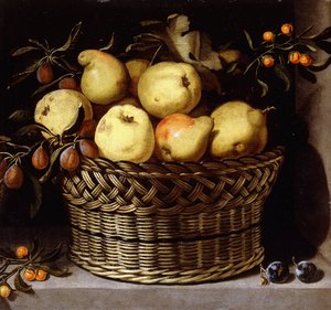 Ein Weidenkorb mit Früchten auf einem Steinsims