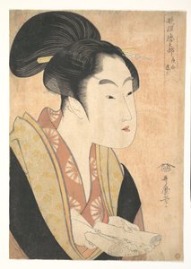 Eine junge Frau liest einen Brief von Kitagawa Utamaro