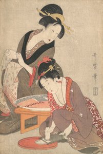 Frauen bereiten Sashimi zu von Kitagawa Utamaro