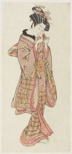 Junge Frau untersucht eine Lampionblume von Kitao Shigemasa