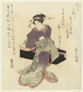 Geisha bindet ihren Gürtel
