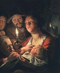 Mutter und Kind bei Kerzenlicht