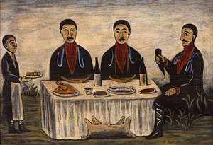 Drei Männer beim Abendessen