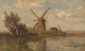 Windmühle an einem Teich
