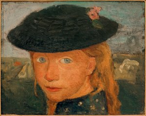 Kopf eines kleinen Mädchens mit Strohhut