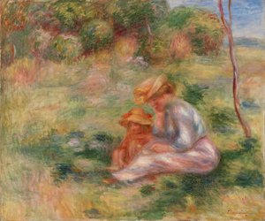 Frau und Kind im Gras