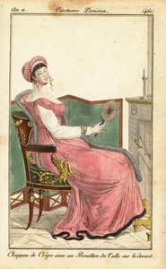 Frau sitzt auf einem Empire-Stuhl in einem Salon, Paris