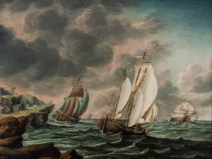 Niederländische Handelsschiffe vor einer felsigen Küste von Pieter Jochums Lofvers