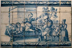 Der Arzt verabreicht einem Patienten einen Einlauf - Satirisches Panel aus Lissabon, erste Hälfte des 18. Jahrhunderts - Museu Nacional dos Azulejos, Lissabon (Portugal)