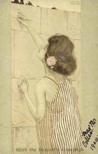 Mädchen schreibt an eine Wand