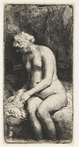 Frau, die ihre Füße an einem Bach badet von Rembrandt van Rijn