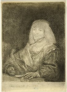 Mann an einem Schreibtisch mit Kreuz und Kette von Rembrandt van Rijn