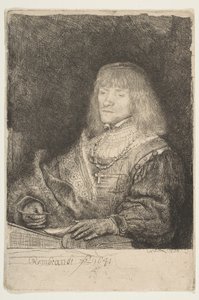 Mann an einem Schreibtisch mit Kreuz und Kette von Rembrandt van Rijn