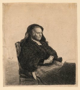 Die Mutter des Künstlers sitzt an einem Tisch, schaut nach rechts: Dreiviertellänge von Rembrandt van Rijn