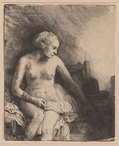 Frau beim Bad mit einem Hut neben ihr von Rembrandt van Rijn