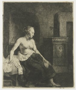 Frau, die halb angezogen neben einem Ofen sitzt von Rembrandt van Rijn