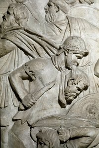 Römische Kunst: Römischer Krieger hält den Kopf eines feindlichen Kriegers zwischen den Zähnen (Abguss von 1862)